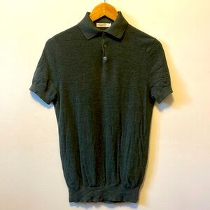 Men’s green Suitsupply short sleeve polo shirt. 100% Merino wool. Size Medium.